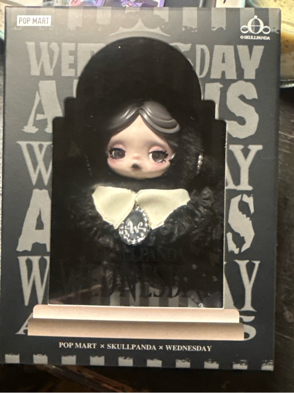 POP MART x SKULLPANDA Wednesday Doll - Black with Cream Bow